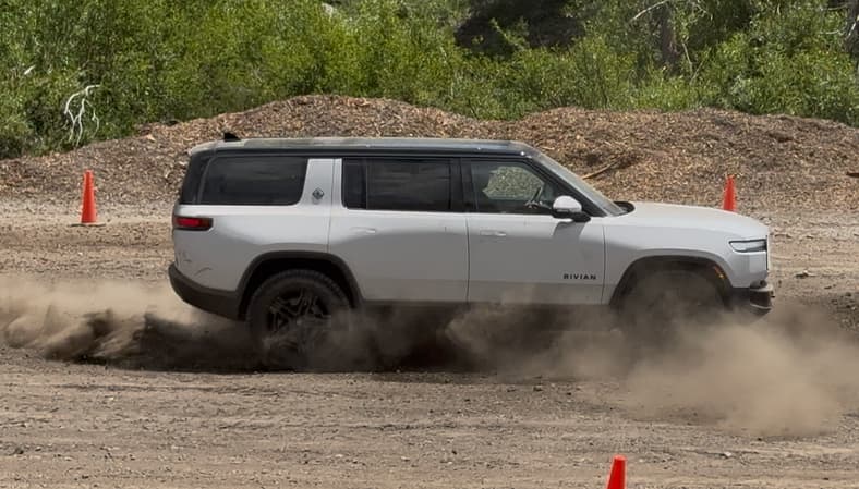 The Rivian Gen 2 R1S Quad Amid A Kick Turn
